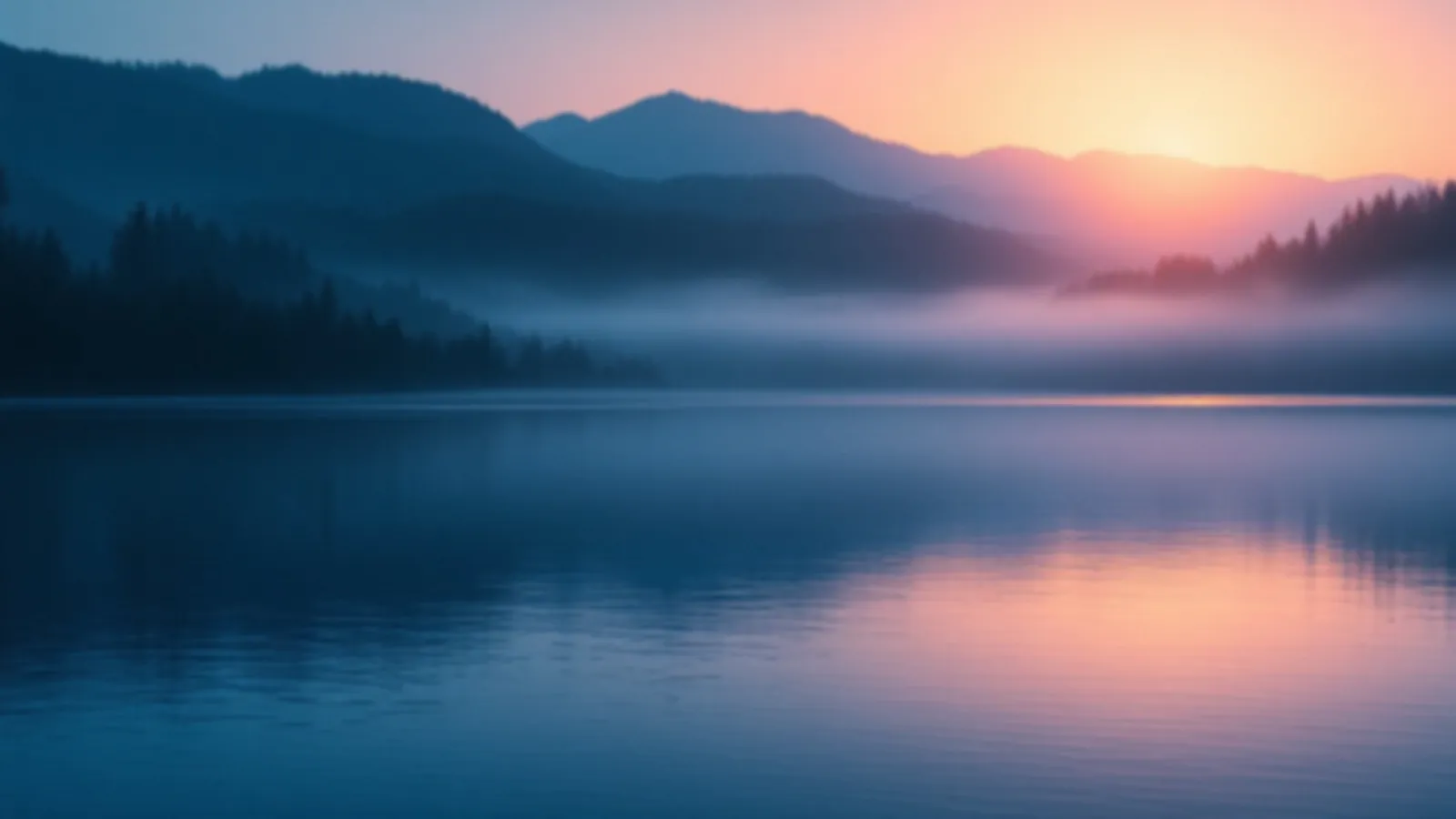 A glowing dawn sky over a calm steel-blue lake with dark forested hills, the ForgNova view of personal loans online, $100 – $5,000
